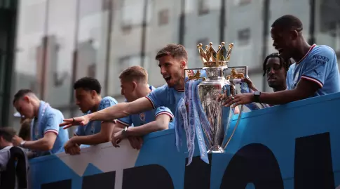 Manchester City players with the trophy (Reuters)