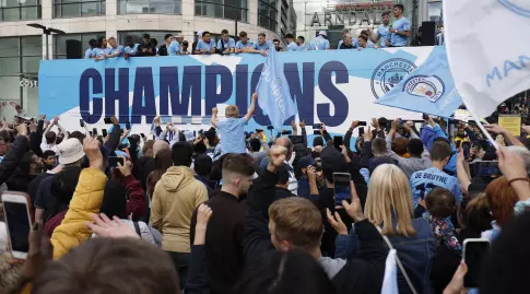 Manchester City fans by bus (Reuters)